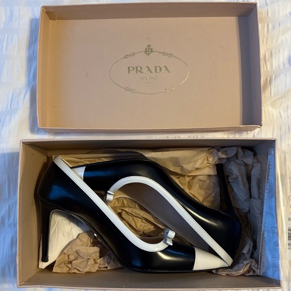 Prada Black Leather Pointed Toe Pumps with White Trim and Bow Accent - Picture 4 of 4